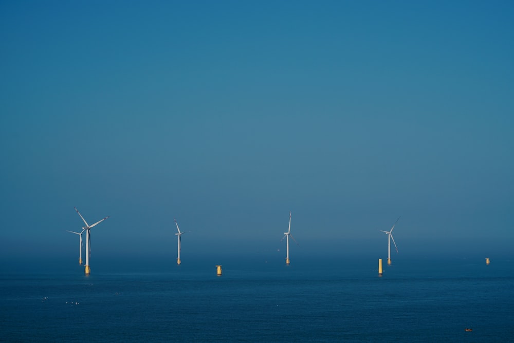 wind turbines on the field during night time