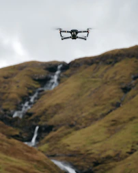 A drone capturing stunning aerial footage of a rustic agriturismo nestled in the Italian countryside.
