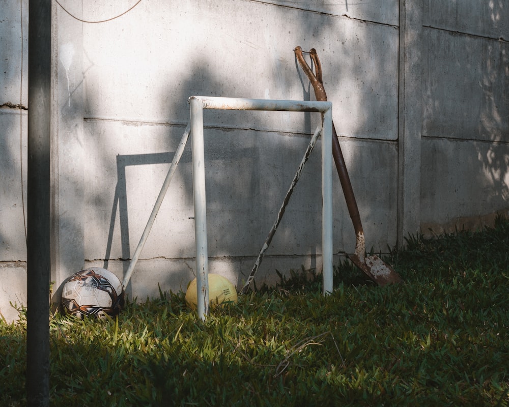 white metal frame on green grass