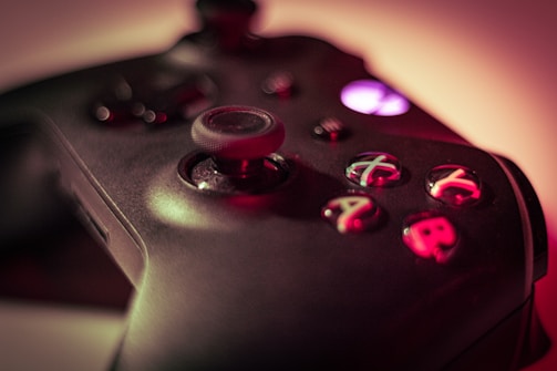 A close-up of a gaming controller with intense focus.