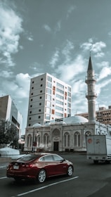 A scenic view of Mecca with a tow truck parked nearby.