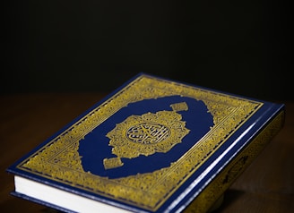 blue and gold hardbound book