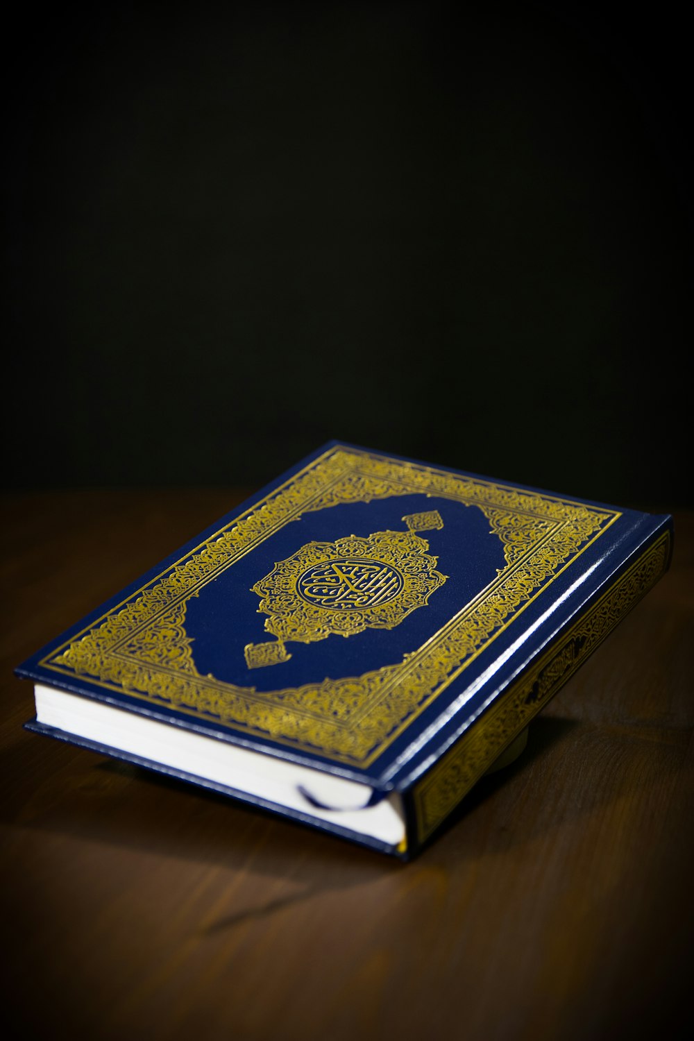 blue and gold hardbound book