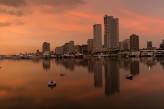 Luxurious high-rise apartment tower at sunset in Dubai Marina
