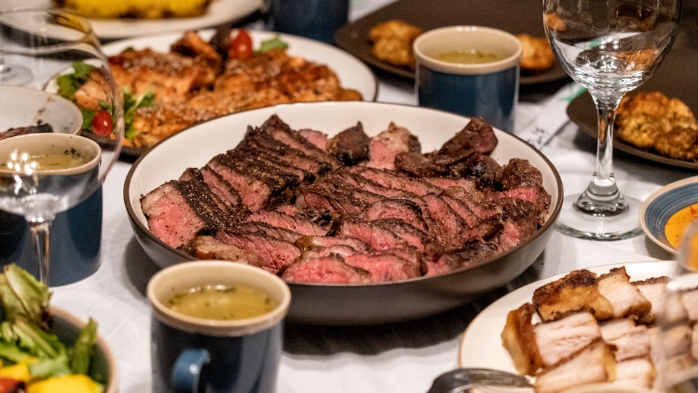 sliced meat on white ceramic plate