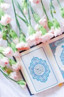 pink and white roses on blue and white floral box