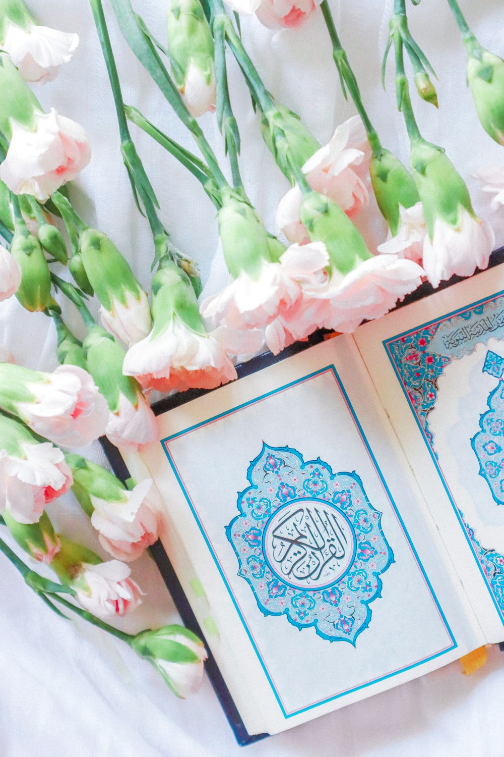 pink and white roses on blue and white floral box