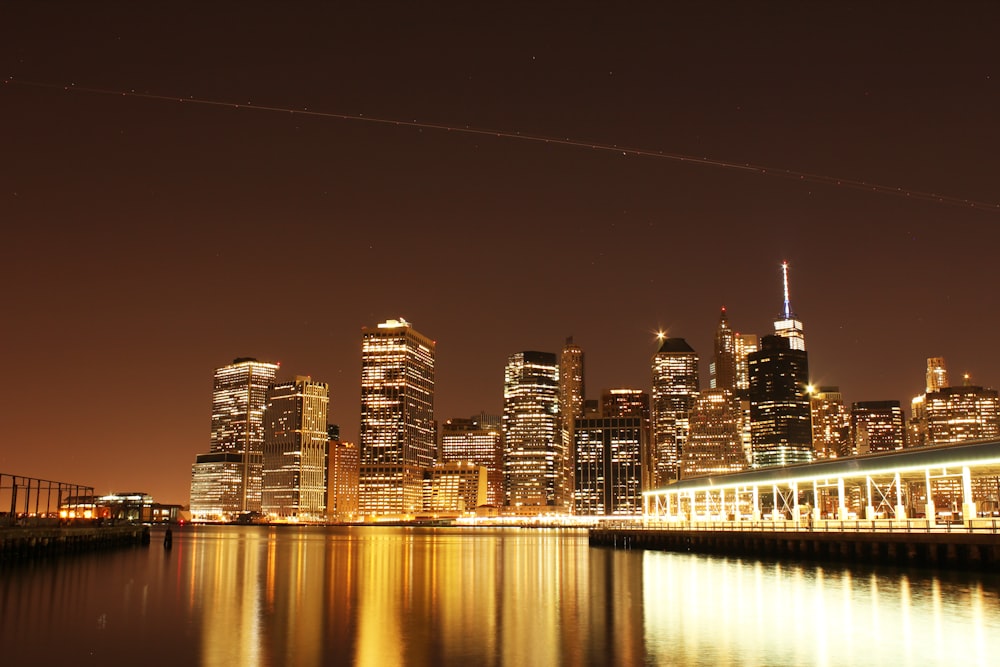 city skyline during night time