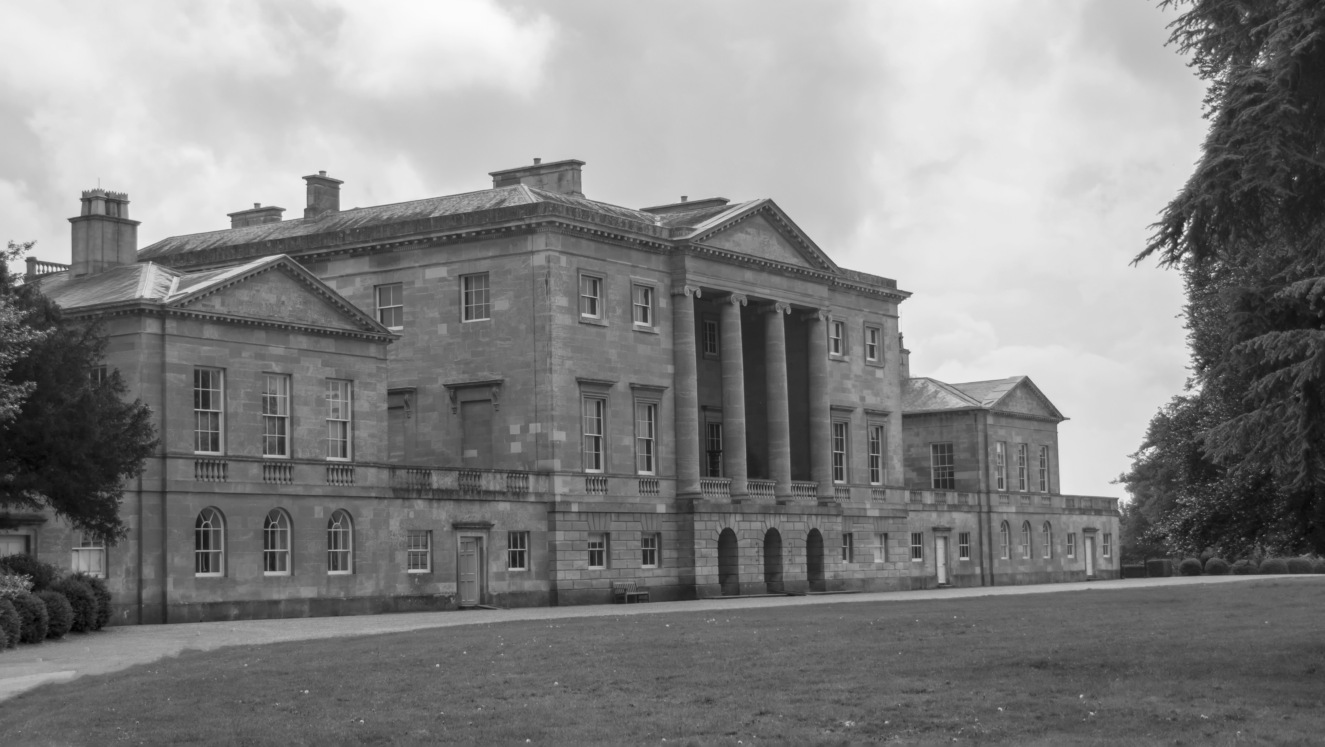 grayscale photo of concrete building