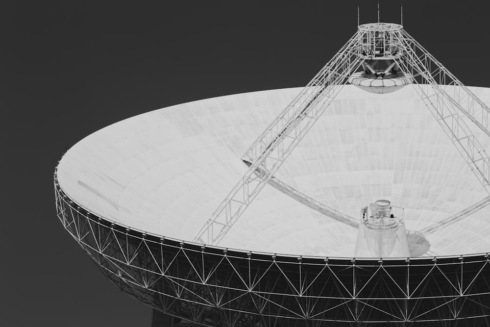 grayscale photo of satellite dish