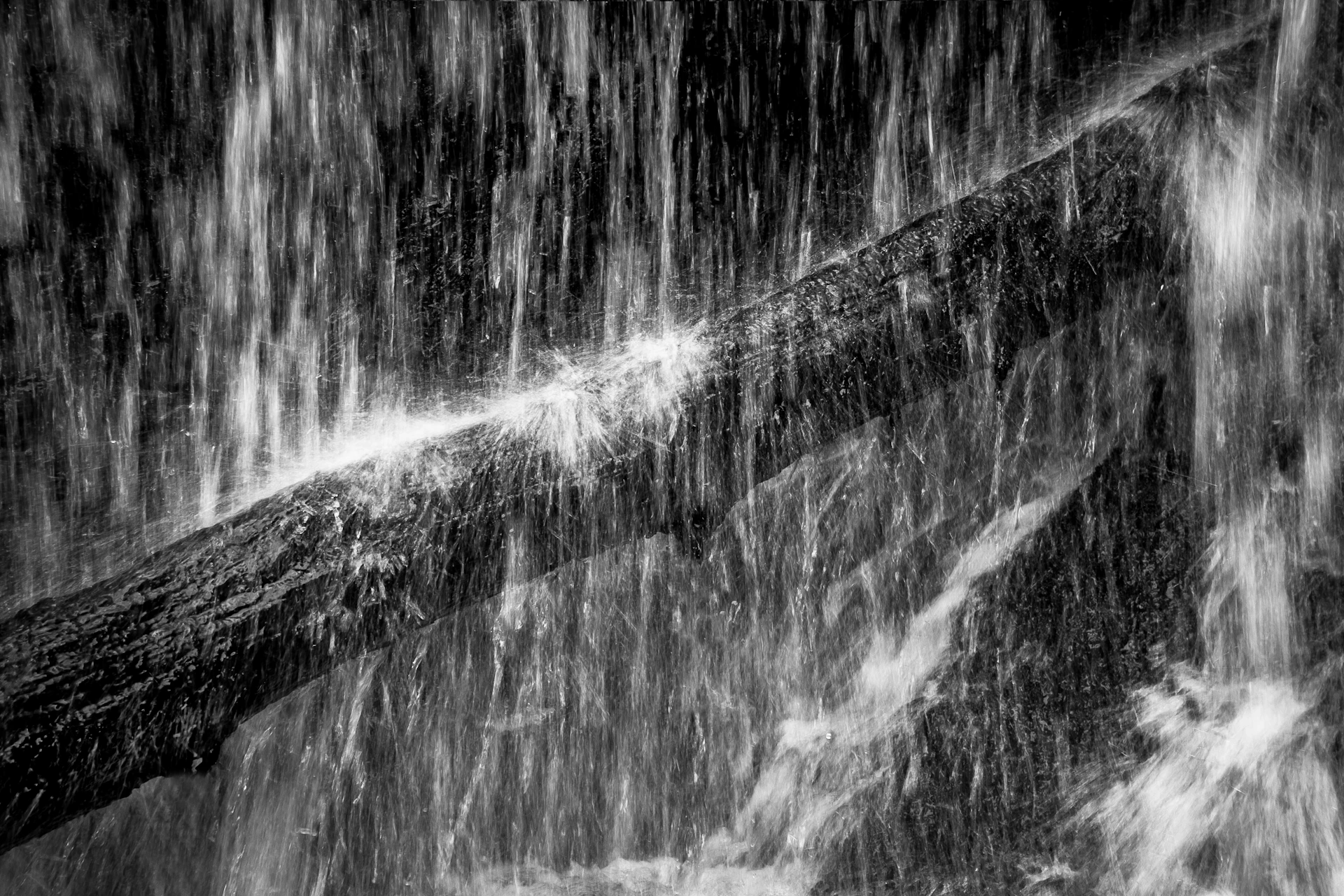 grayscale photo of water splash