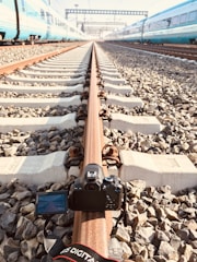 Drone capturing high-resolution RGB imagery over a railway track.