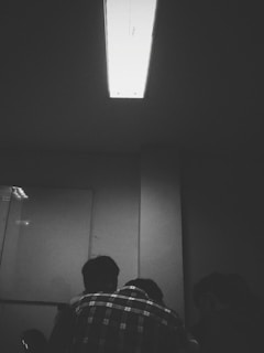 Warm lighting over a small group engaged in an interactive learning session in a cozy conference room