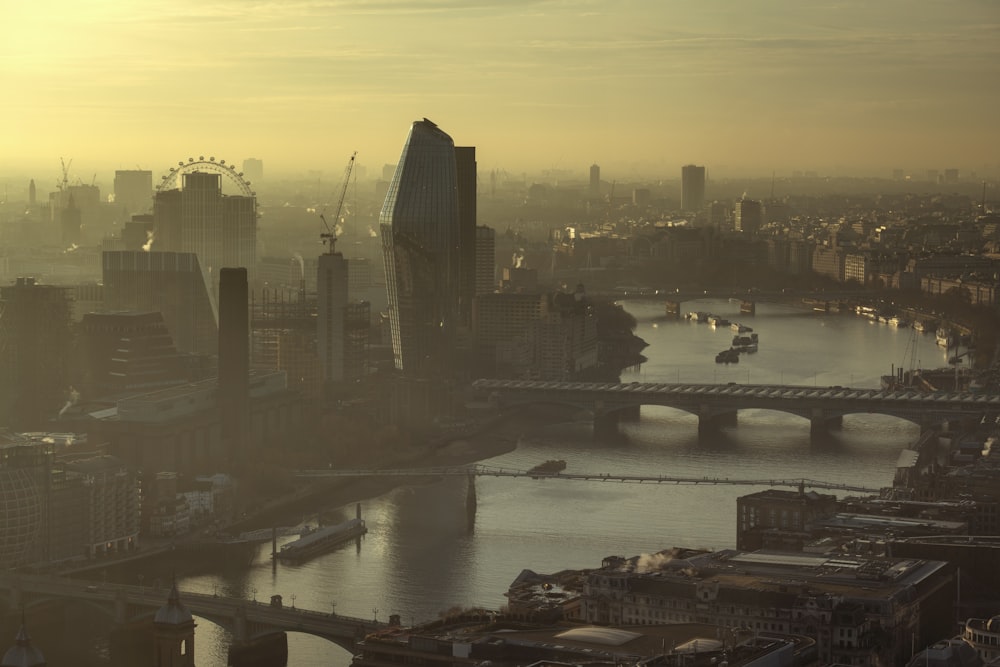 city skyline during sunset with river