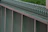 Close-up of a modern Vistaguard fence showcasing its distinctive pattern and texture.