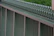 Close-up of a modern Vistaguard fence showcasing its distinctive pattern and texture.