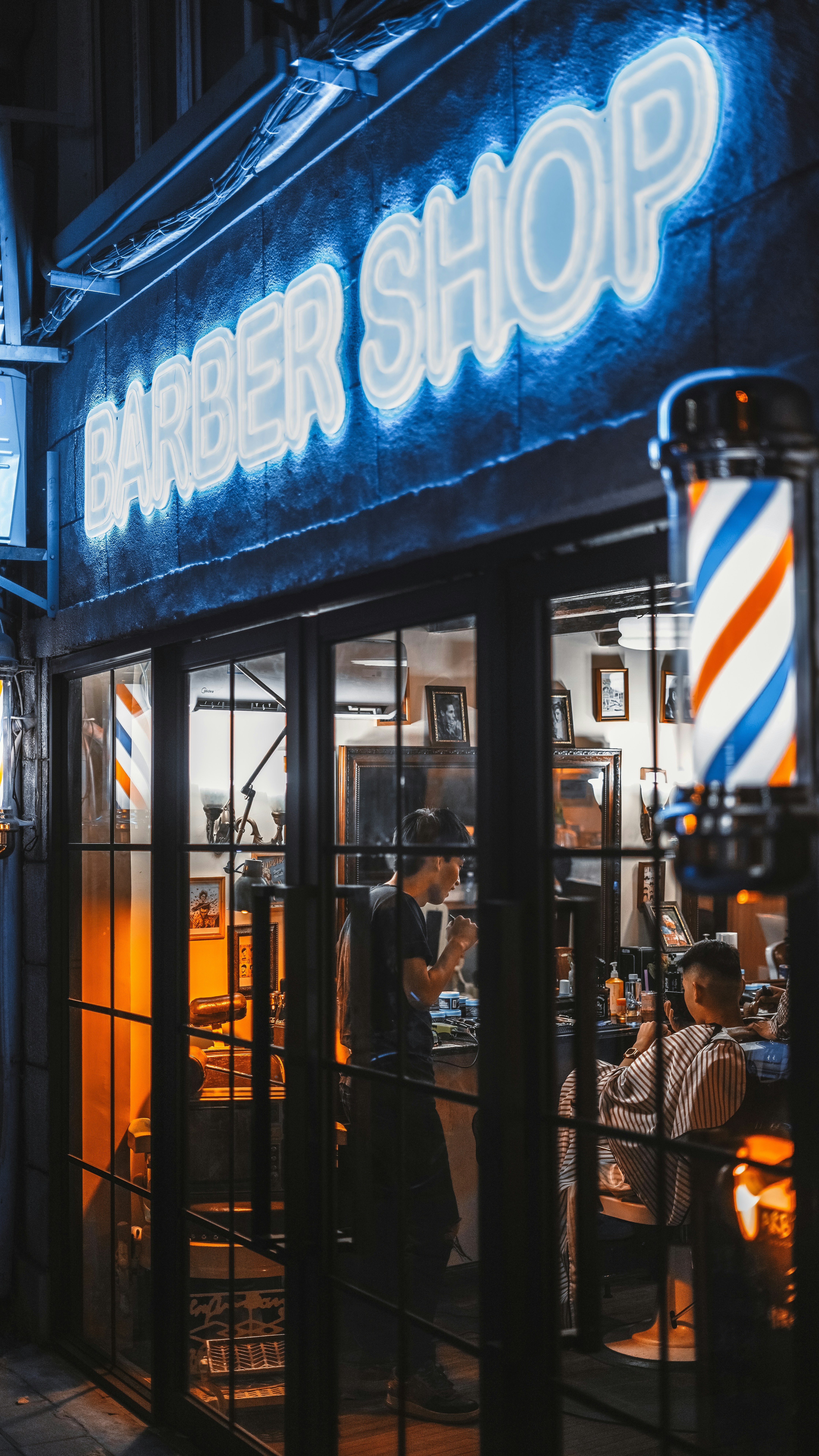 Barber shop with vintage-style decor and a barber at work