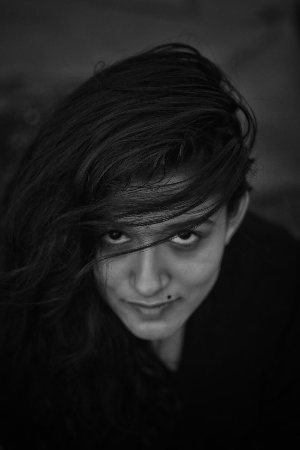 grayscale photo of womans face