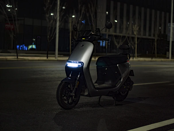 black and gray motorcycle on road during night time