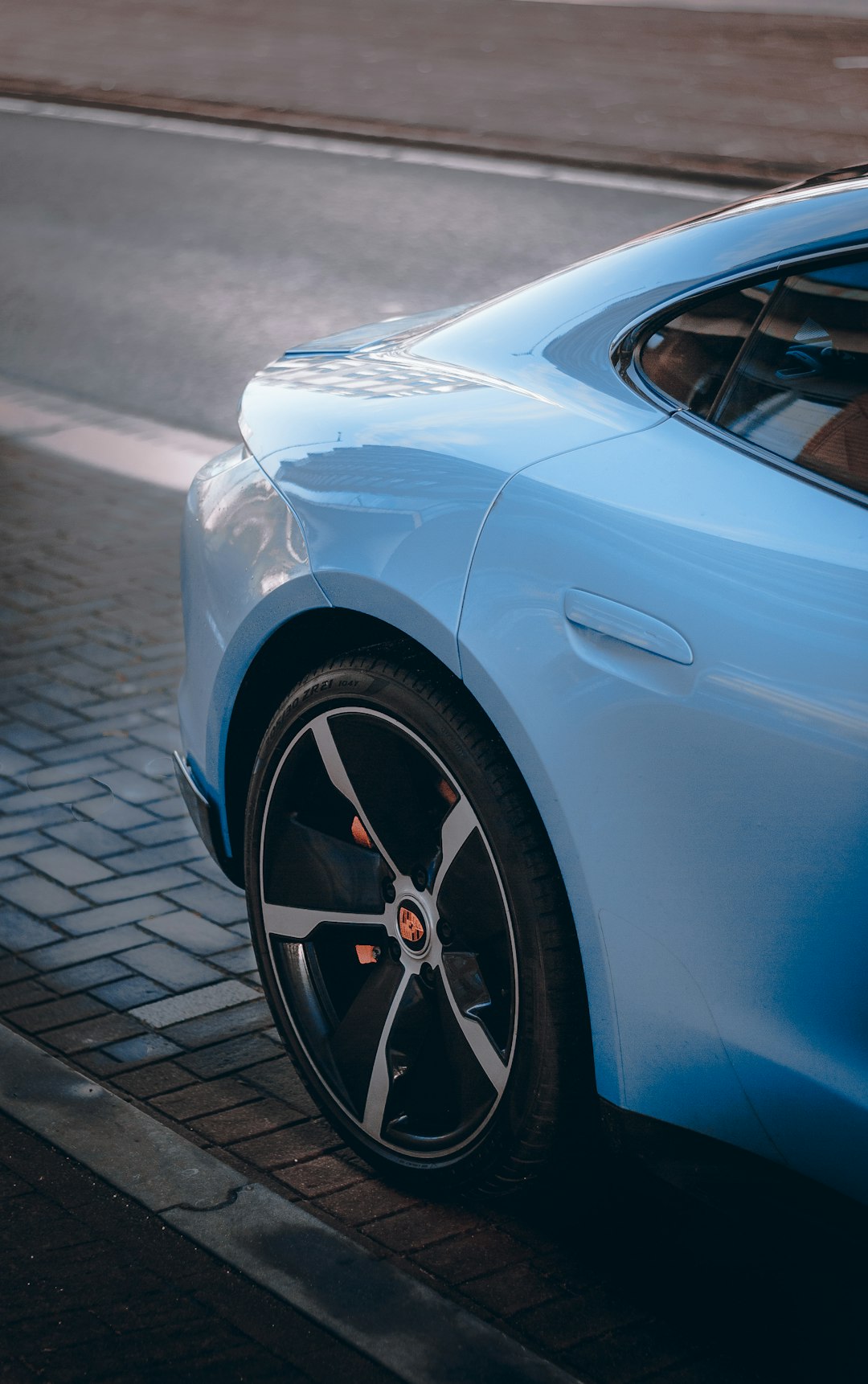 white car on gray concrete road