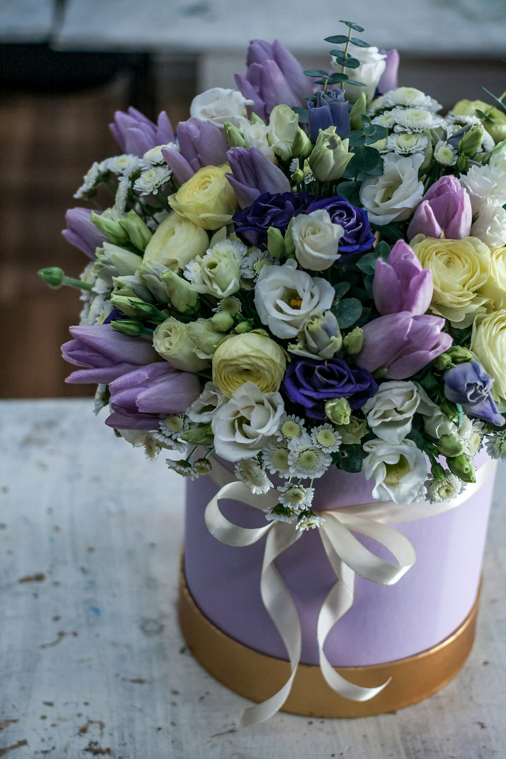 purple and white flower bouquet