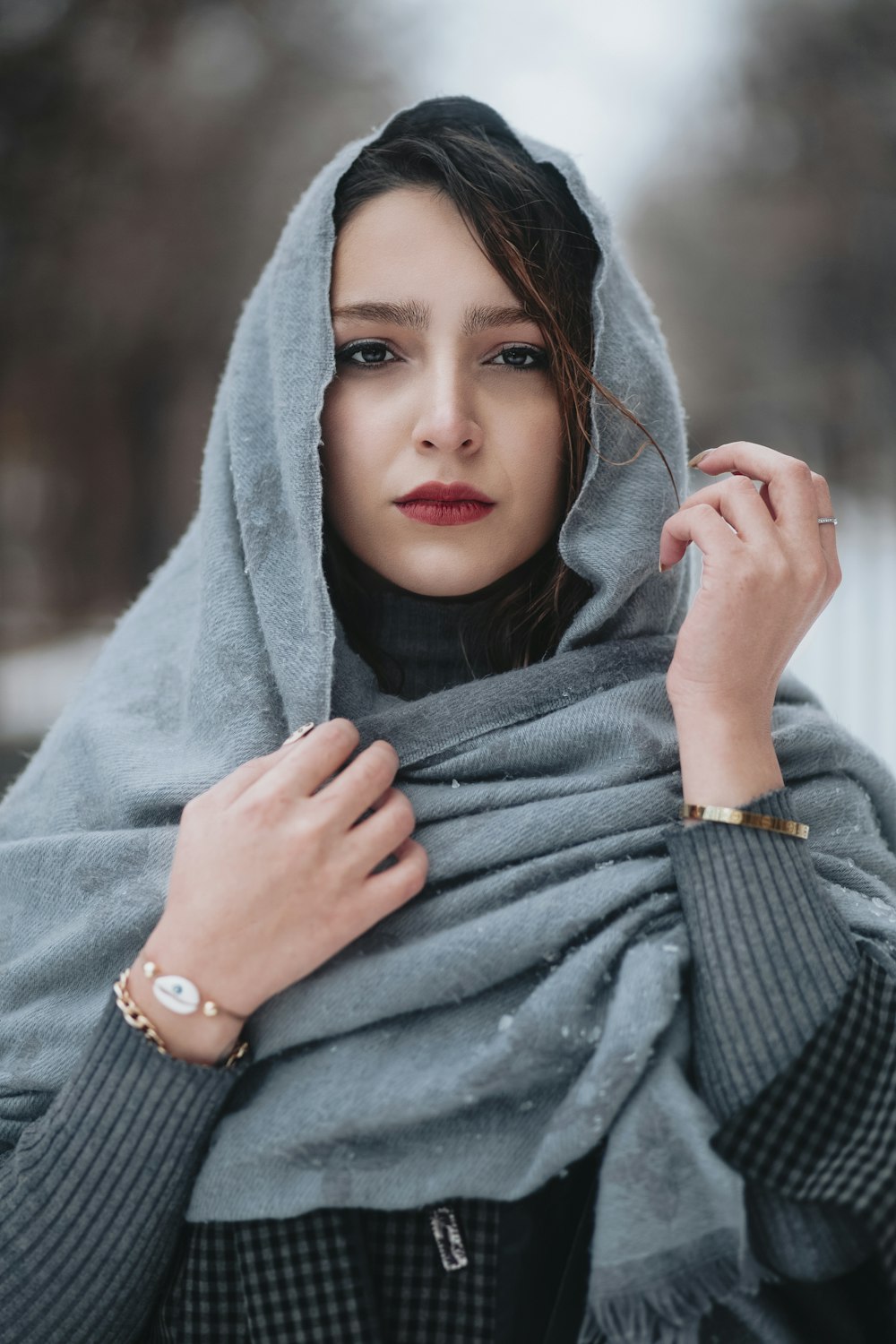 woman in gray hijab and silver ring