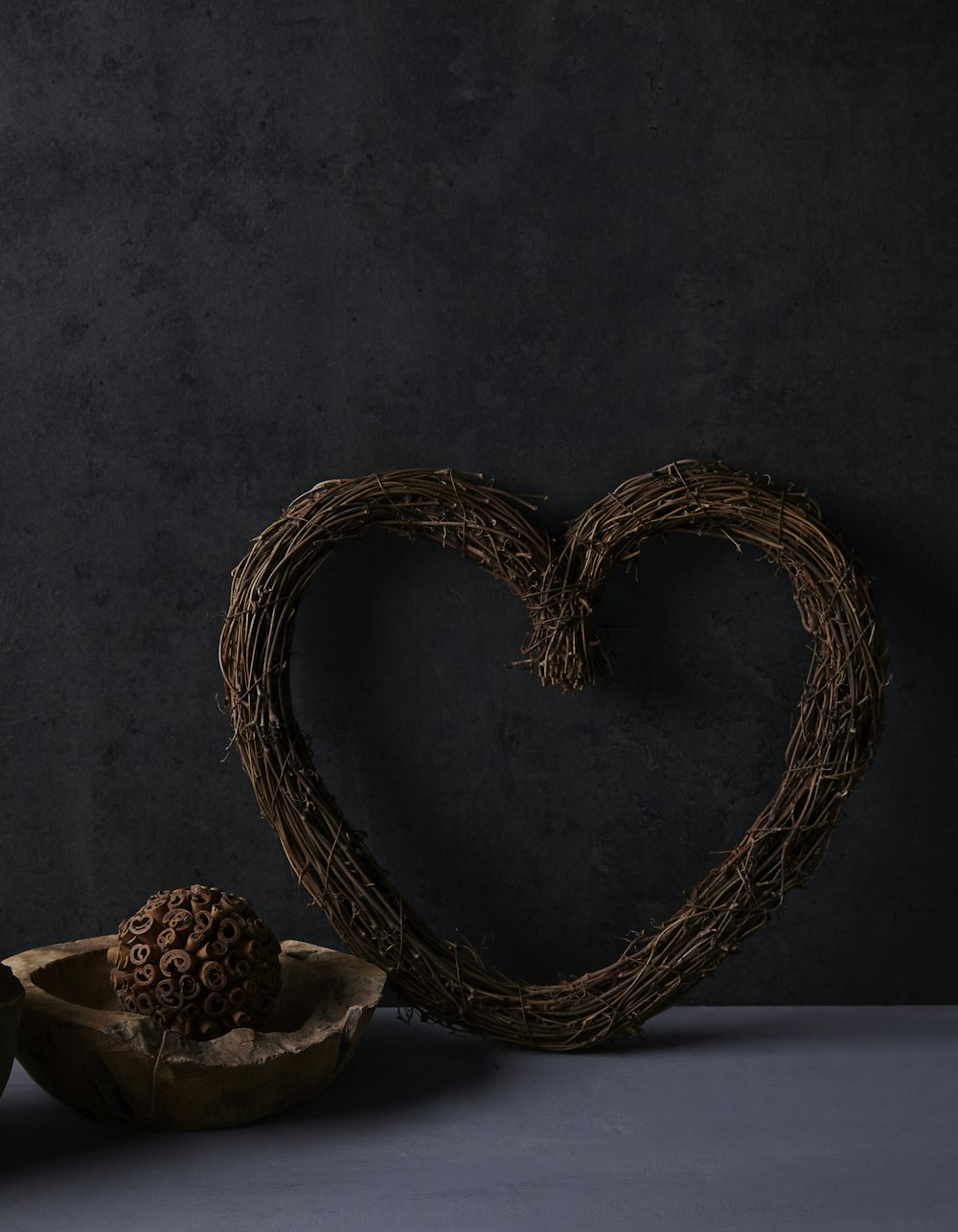 brown woven basket on white table