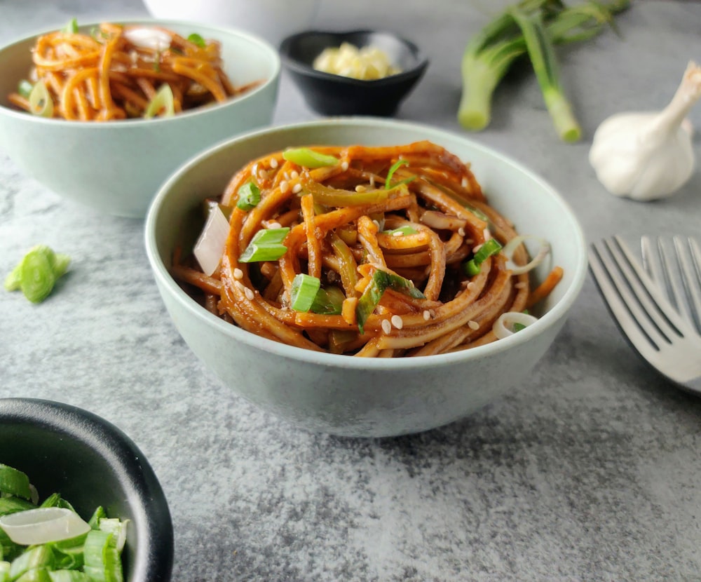 sliced vegetables in white ceramic bowl