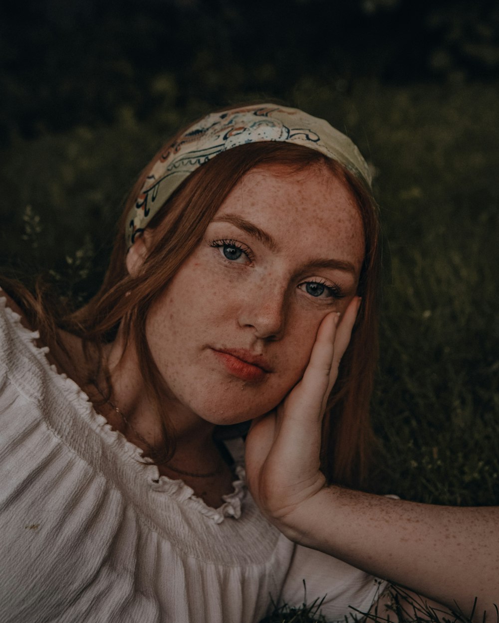 woman in white knit shirt