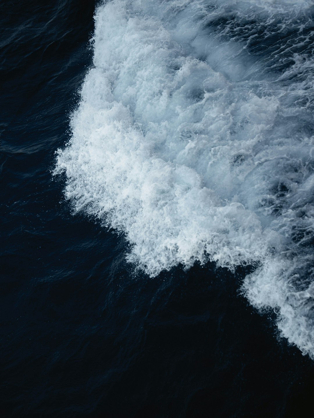 white clouds over blue sea