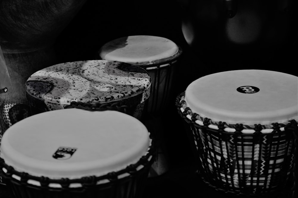 grayscale photo of white and black drum