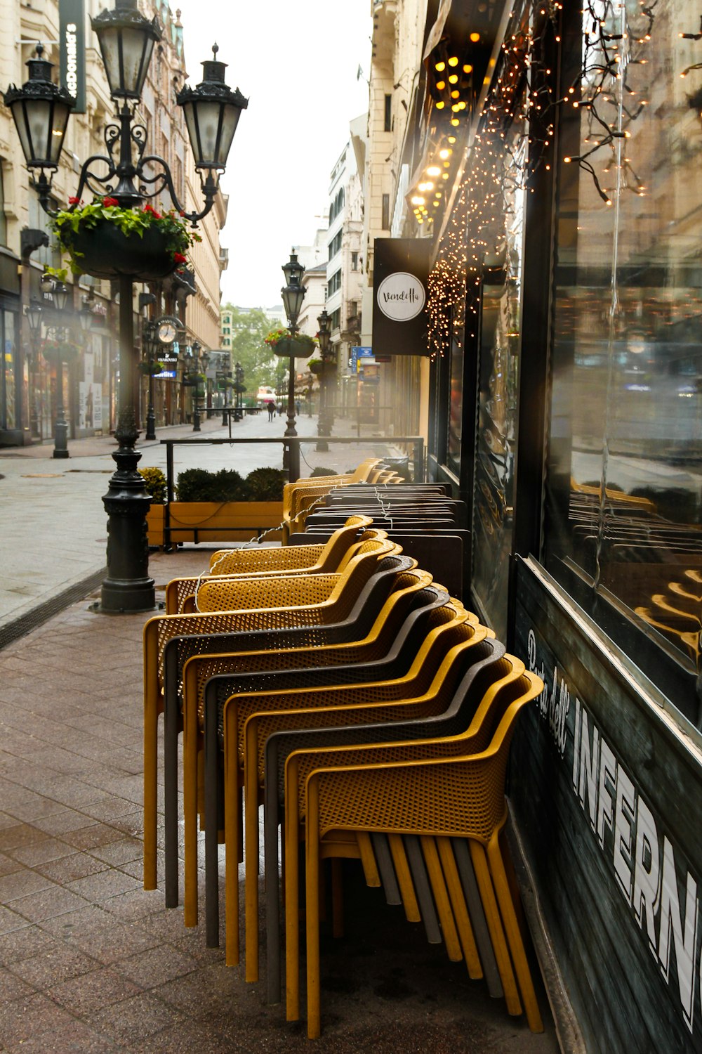 black metal framed brown wooden chairs