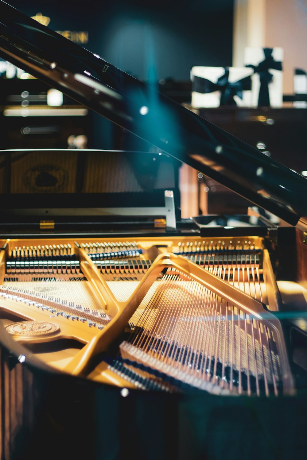 brown and black piano in room