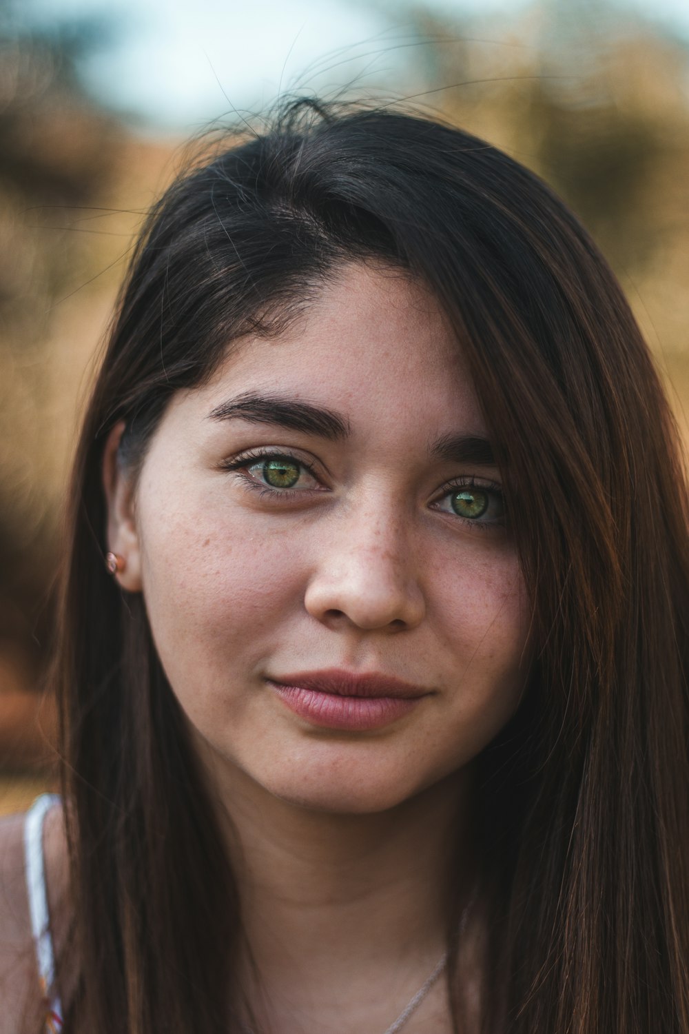 woman with brown hair smiling