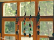 Colorful suncatchers hanging in a bright window