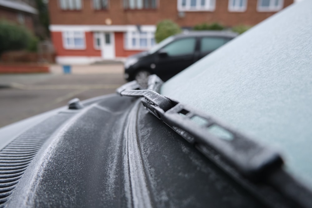 black car on road during daytime