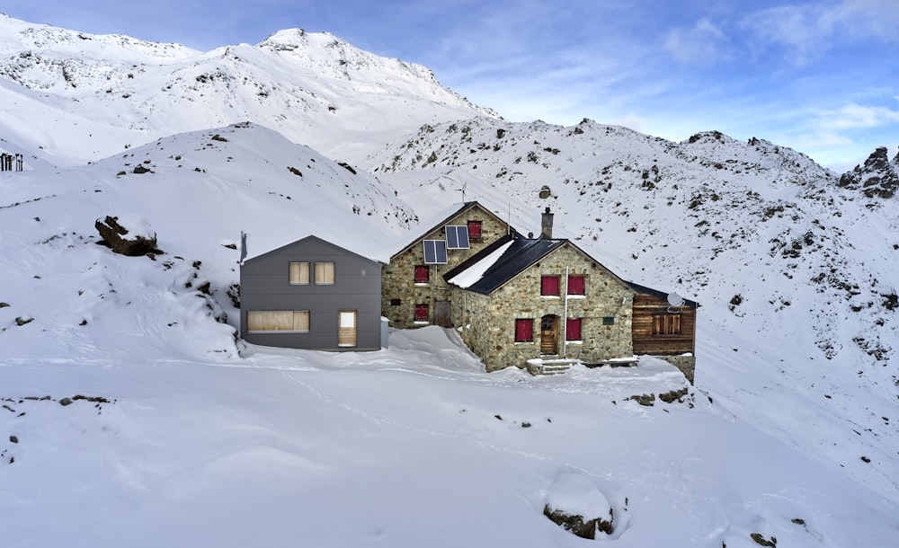 brown and white house on snow covered ground