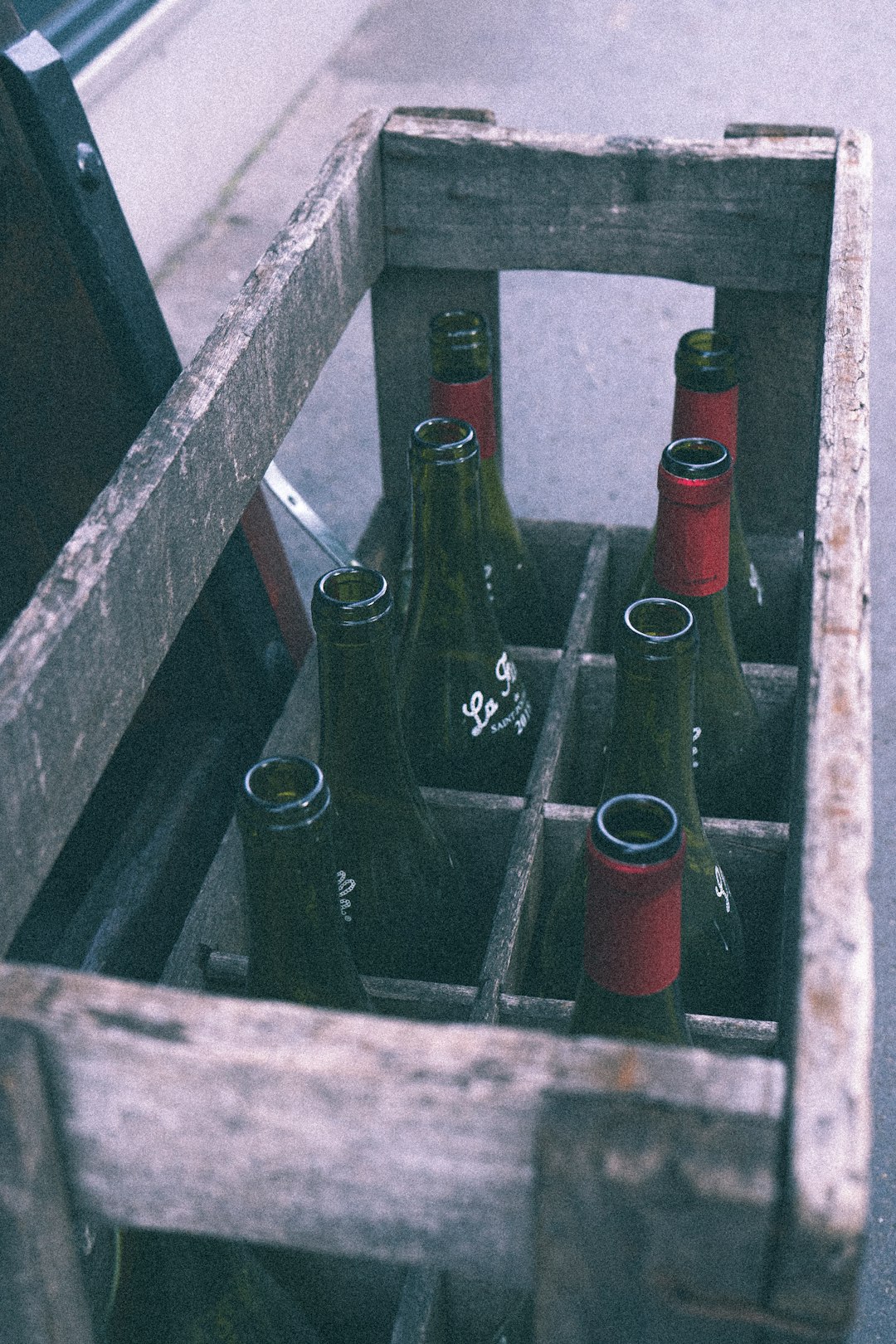 coca cola bottles on brown wooden shelf