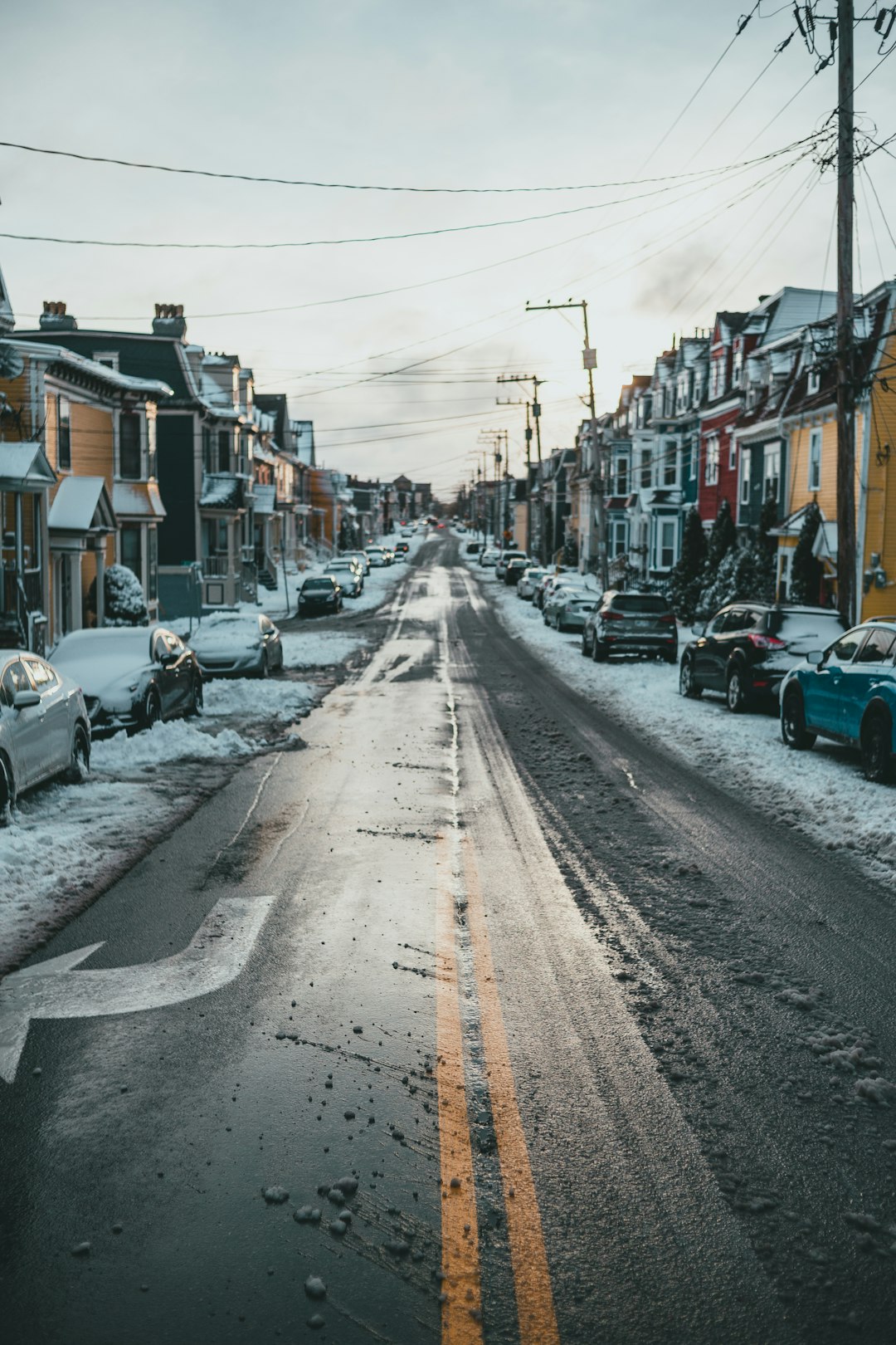 cars parked on side of the road during daytime