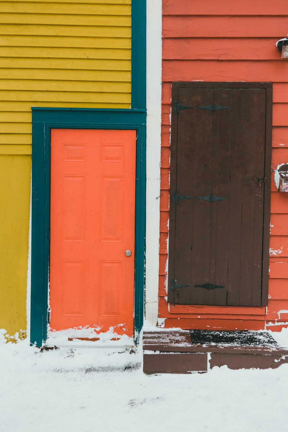 blue wooden door with white wooden frame