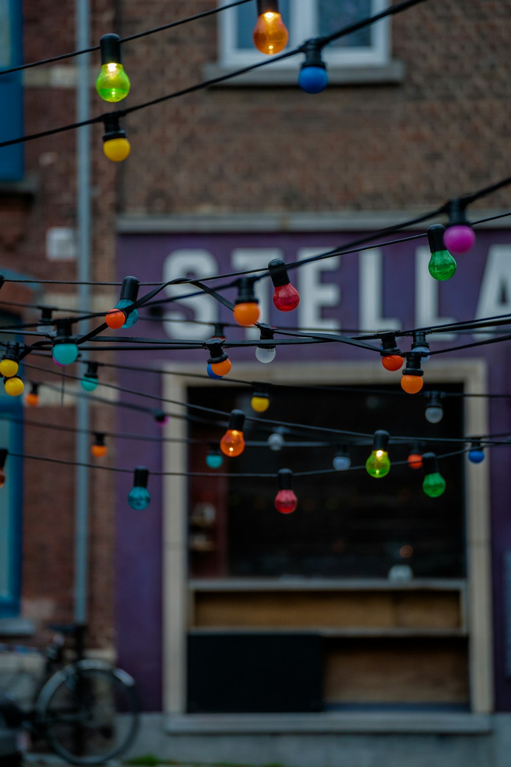 purple yellow and pink string lights