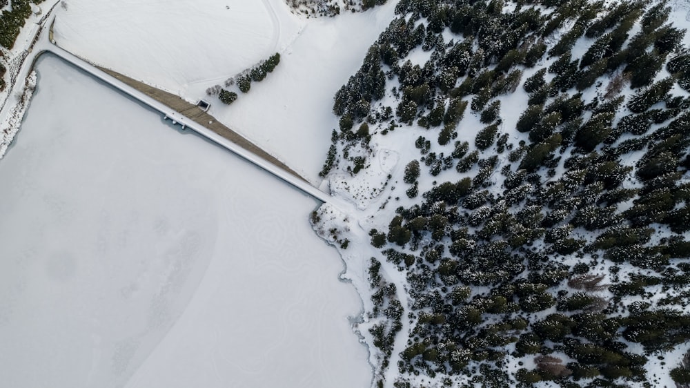 aerial view of snow covered field during daytime