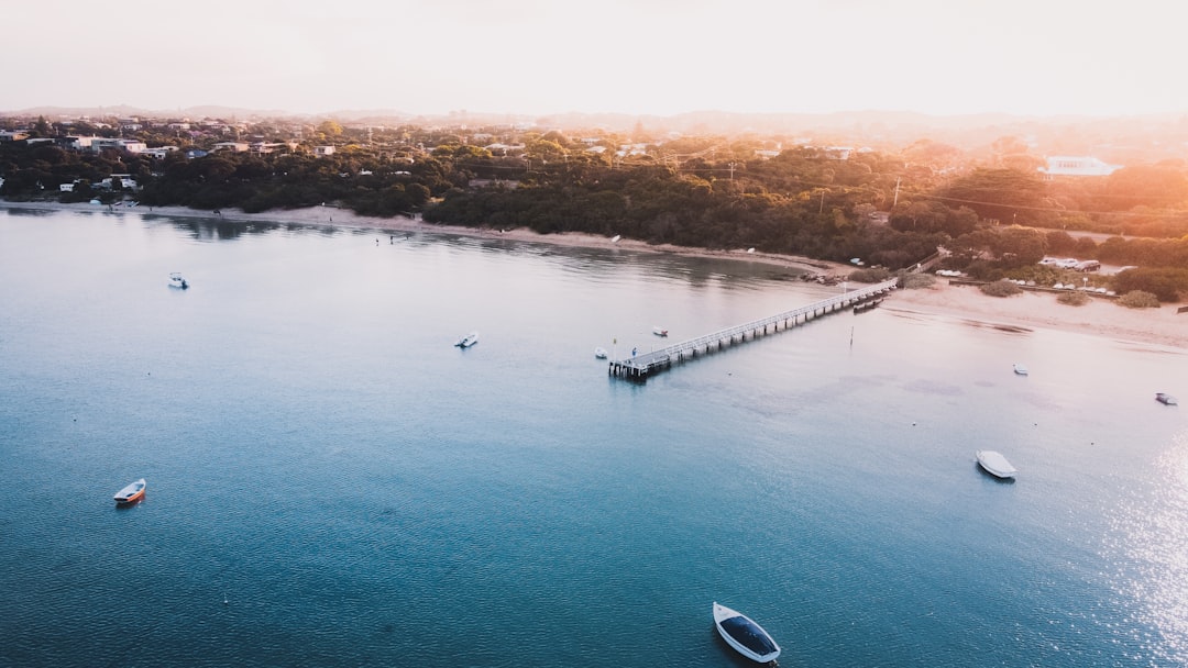 aerial view of people on boat on sea during daytime