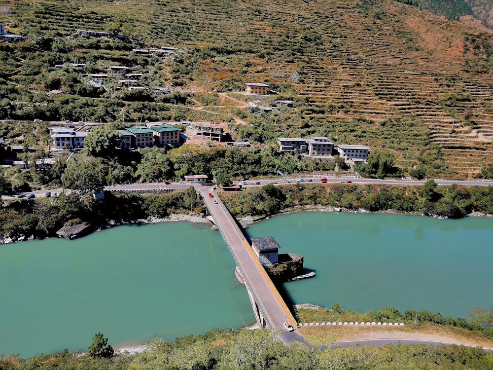 aerial view of city near body of water during daytime