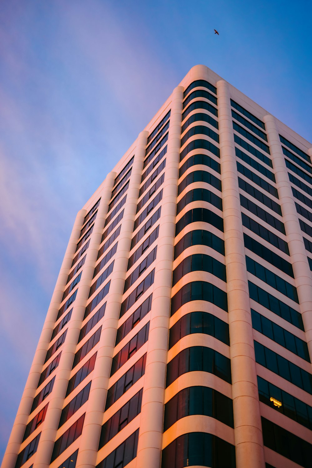 brown concrete building under blue sky during daytime