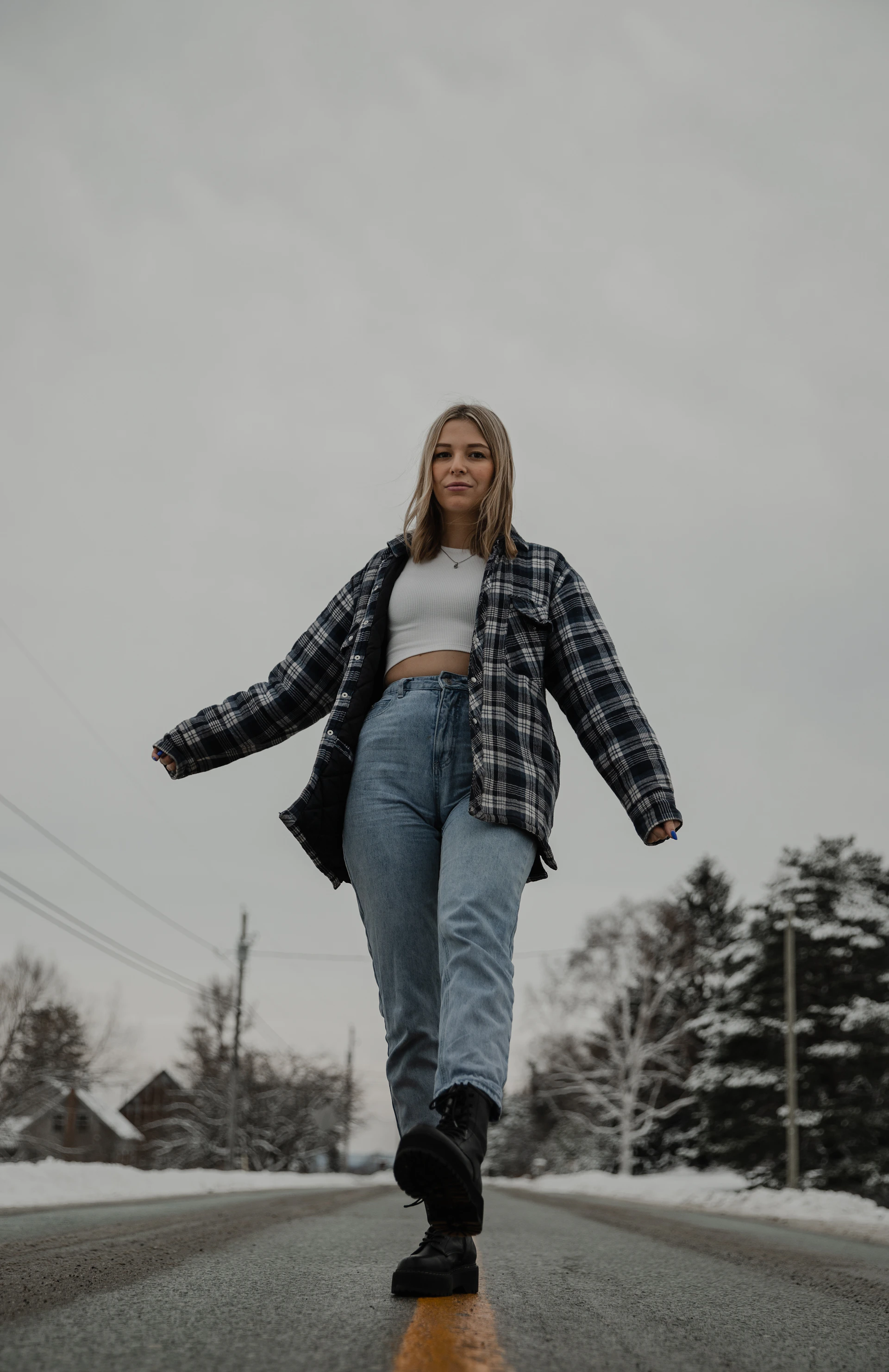 woman wearing yellow long-sleeved dress under white clouds and blue sky during daytime