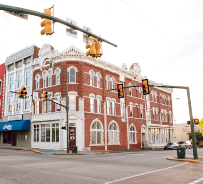A renovated historic brick building converted into boutique retail spaces.