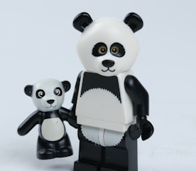 white and black panda figurine