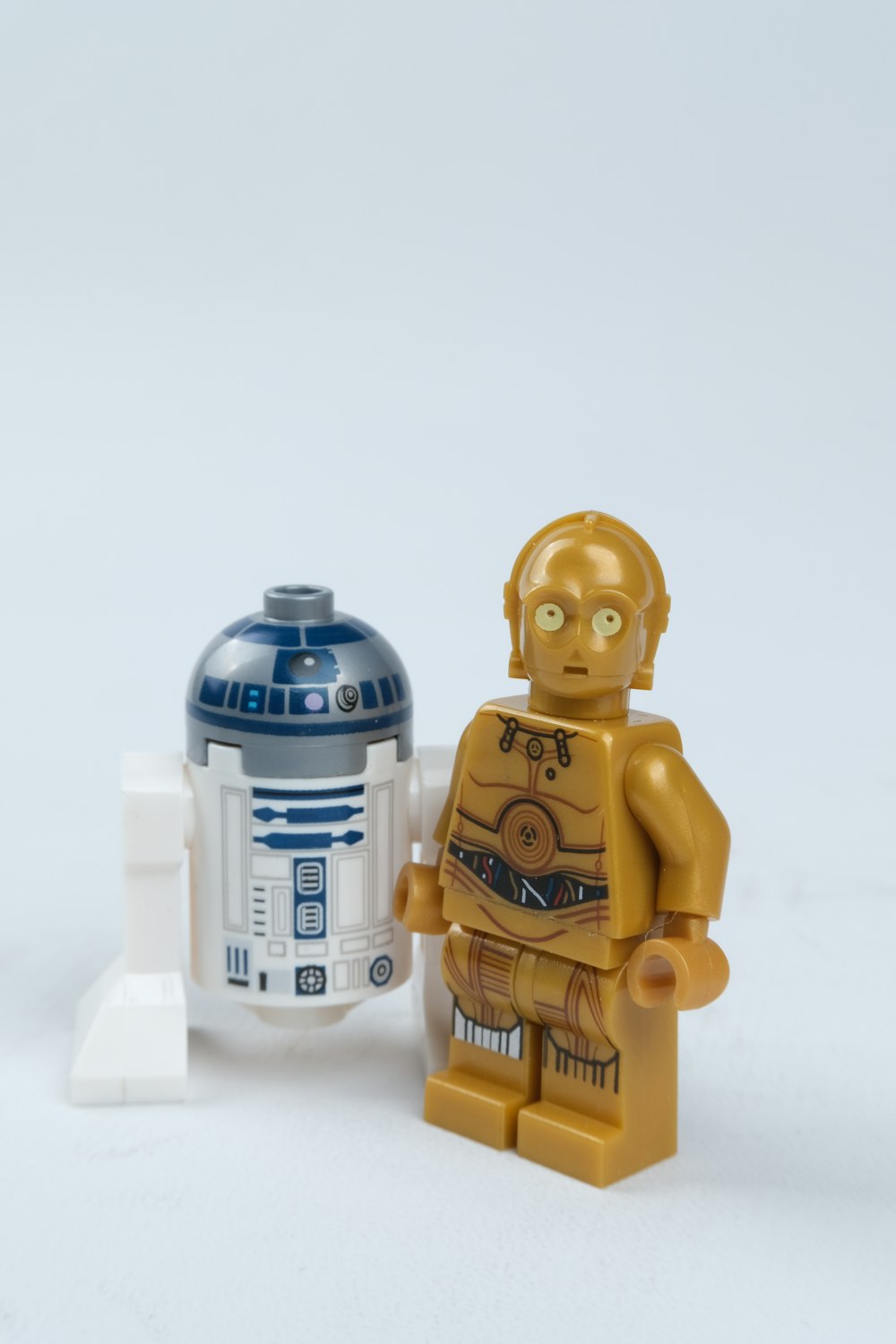 brown robot and r 2 d 2