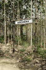 Visitors enjoying archery class in the open forest area at Tentrem Jiwo.